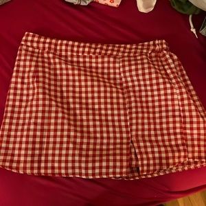 This is a SHEIN skirt. Red and white. Very cute. Skirt in the front and shorts